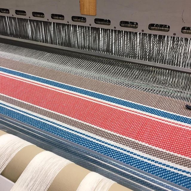 Sneak peek! Today we’re weaving another of the three new #Duffle Stripes that will join the AW 21/22 collection in the coming months. Once milled and finished, this will have the same luxurious lofty handle as classic Duffle. Perfect for Designers looking to make a statement! Rest assured that our teams are working hard to continue production of our cloth in a safe manner, adhering to Government advice and social distancing regulations in each area of the mill. #luxuryfabrics #clothmerchant #outerwear #autumnwinter #wool #choosewool #fashiondesigner #fabricofanation #AW2122